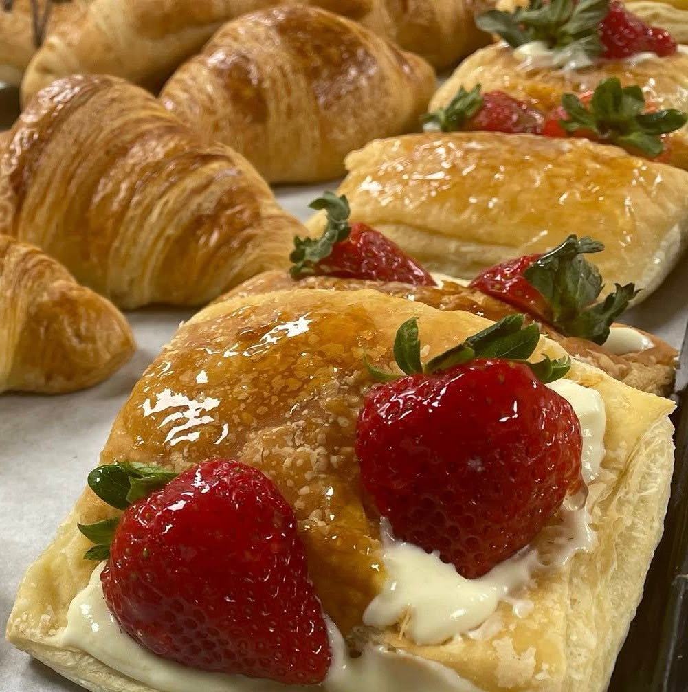 Strawberry-topped pastries fresh from the oven